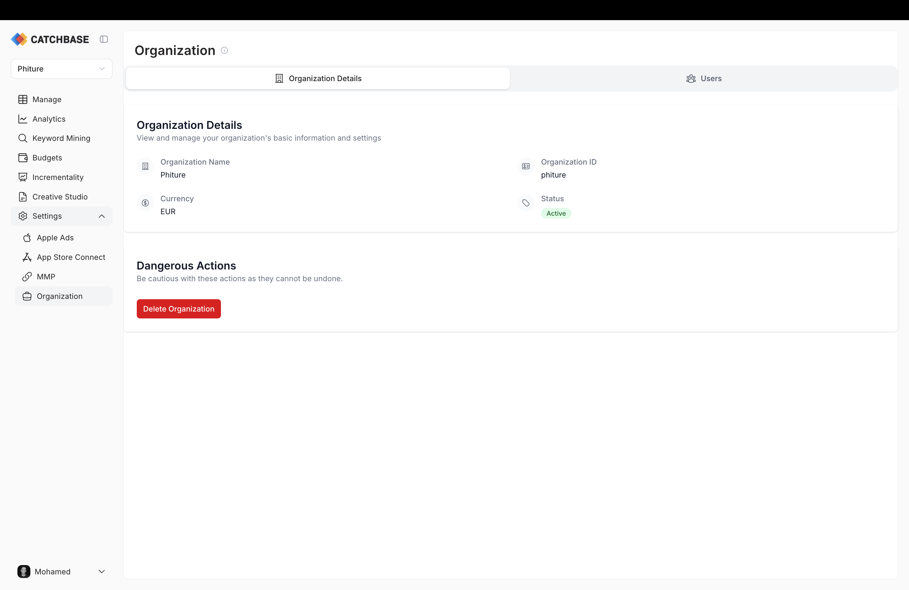 Organization Details tab with name, ID, currency, and status